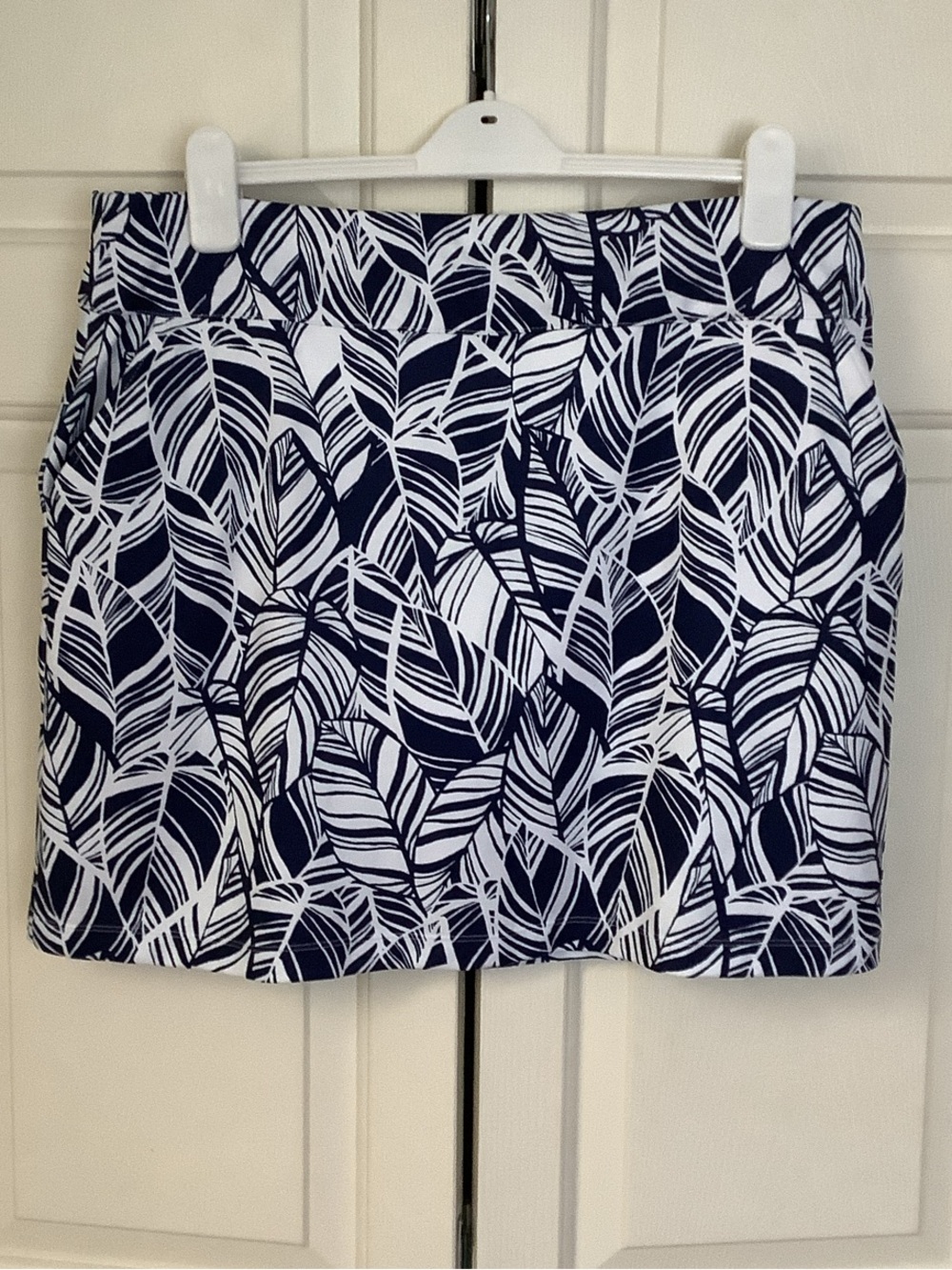 Coral Bay Golf Skort in Navy and White Leaf Print .